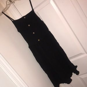 Brand new black mini dress. Size small.